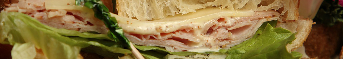 Eating Sandwich at Hoagie Hut restaurant in Miami, FL.